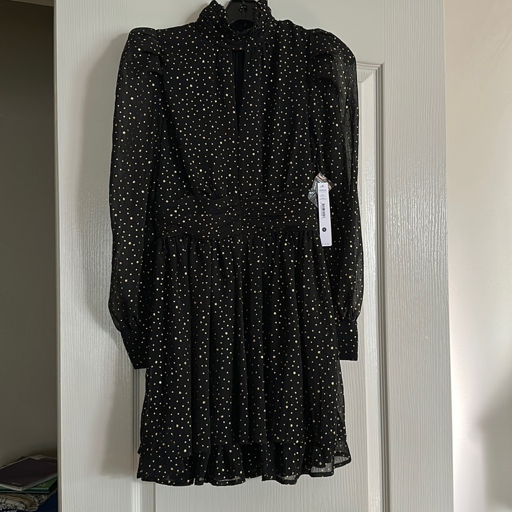 Aqua by Bloomingdales Dress size small. Black with gold stars.